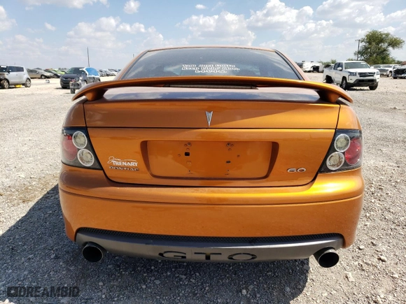 2006 Pontiac GTO with VIN 6G2VX12U76L521089, listed as a Copart auction lot 73374044 with 87,963 mi miles and Salvage Title. Bid and sale history available at carsss.com. Image 6.