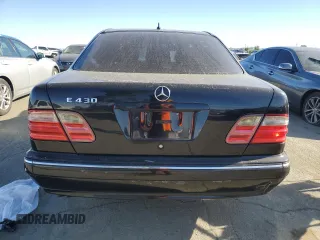 2001 Mercedes-Benz E-Class with VIN WDBJF70JX1B327997, listed as a Copart auction lot 87650175 with 268,045 mi miles and Salvage Title. Bid and sale history available at carsss.com. Image 6.