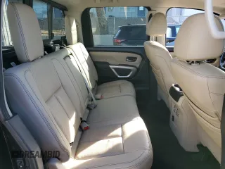 2017 Nissan Titan SL z VIN 1N6BA1F20HN522403, wystawiony jako Copart lot #87477114 z przebiegiem 98 084 mil mil oraz Szkoda całkowita • Salvage title. Historia ofert i sprzedaży dostępna na DreamBid. Obrazek 11.