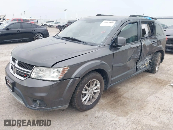 2015 Dodge Journey SXT with VIN 3C4PDCBG2FT649308, listed as a IAAI auction lot 42285409 with 140,668 mi miles and . Bid and sale history available at DreamBid. Image 2.