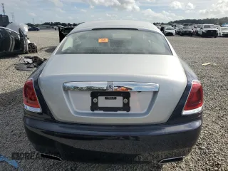 2014 Rolls-Royce Wraith z VIN SCA665C55EUX84597, wystawiony jako Copart lot #79843344 z przebiegiem Nie podano mil oraz Szkody całkowita. Historia ofert i sprzedaży dostępna na DreamBid. Obrazek 6.