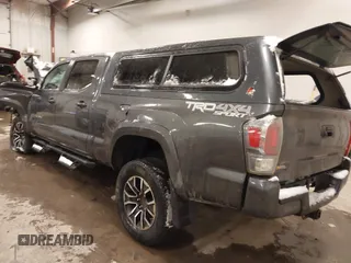 2020 Toyota Tacoma SR5 z VIN 5TFDZ5BN5LX049669, wystawiony jako IAAI lot #41172088 z przebiegiem 80 559 mil mil oraz . Historia ofert i sprzedaży dostępna na DreamBid. Obrazek 3.