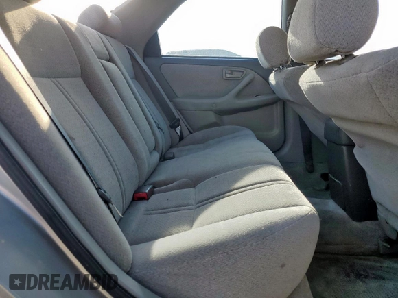 2001 Toyota Camry CE z VIN 4T1BG22K01U085409, wystawiony jako Copart lot #55941765 z przebiegiem 215 062 mil mil oraz Szkoda całkowita • Salvage title. Historia ofert i sprzedaży dostępna na DreamBid. Obrazek 10.