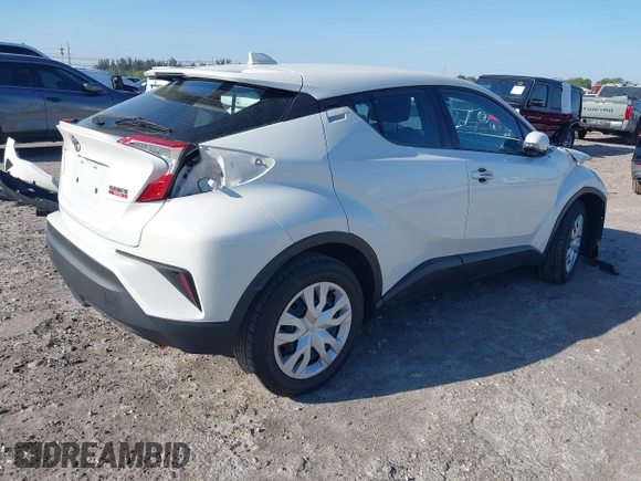 2021 Toyota C-HR LE with VIN NMTKHMBX6MR121247, listed as a IAAI auction lot 41701773 with 57,743 mi miles. Bid and sale history available at carsss.com. Image 4.