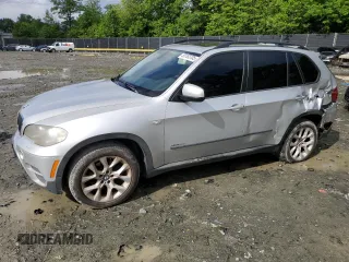 2012 BMW X5 35i z VIN 5UXZV4C56CL747613, wystawiony jako Copart lot #55182705 z przebiegiem 163 786 mil mil oraz Szkoda całkowita • Salvage title. Historia ofert i sprzedaży dostępna na DreamBid. Obrazek 1.