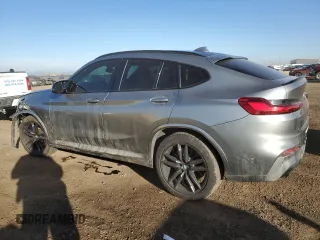 2021 BMW X4 M z VIN 5YMUJ0C02M9F18441, wystawiony jako Copart lot #43973985 z przebiegiem 60 632 mil mil oraz Szkoda całkowita • Salvage title. Historia ofert i sprzedaży dostępna na DreamBid. Obrazek 2.