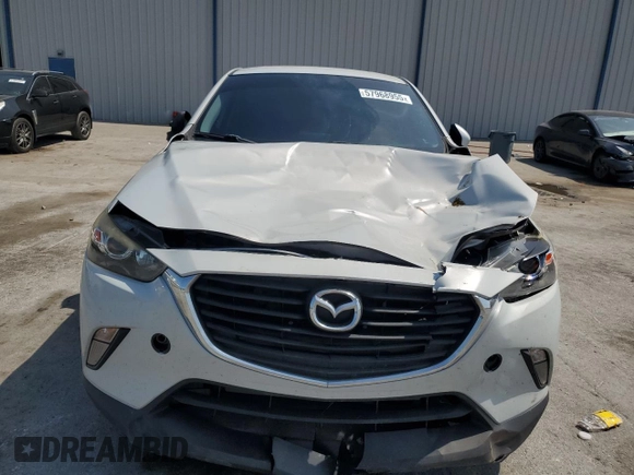 2017 Mazda CX-3 Touring z VIN JM1DKDC75H0168823, wystawiony jako Copart lot #57968955 z przebiegiem 116 231 mil mil oraz Szkoda całkowita • Salvage title. Historia ofert i sprzedaży dostępna na DreamBid. Obrazek 5.