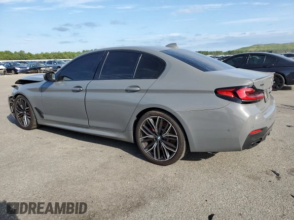 2022 BMW 5 Series M550i xDrive z VIN WBA13BK00NCJ03264, wystawiony jako Copart lot #68976084 z przebiegiem 39 515 mil mil oraz Szkoda całkowita • Salvage title. Historia ofert i sprzedaży dostępna na DreamBid. Obrazek 2.