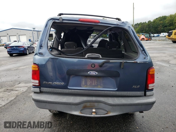 2000 Ford Explorer XLS z VIN 1FMZU62X7YZA65813, wystawiony jako Copart lot #72015374 z przebiegiem 372 066 mil mil oraz Nie do naprawy • Non repairable. Historia ofert i sprzedaży dostępna na DreamBid. Obrazek 6.