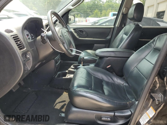 2004 Ford Escape Limited with VIN 1FMCU04164KB51256, listed as a Copart auction lot 58969565 with 137,360 mi miles and Salvage title. Bid and sale history available at DreamBid. Image 7.