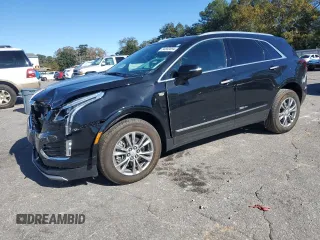 2023 Cadillac XT5 FWD Premium Luxury with VIN 1GYKNCR40PZ189444, listed as a Copart auction lot 84803094 with 22,827 mi miles and Clean Title. Bid and sale history available at carsss.com. Image 1.