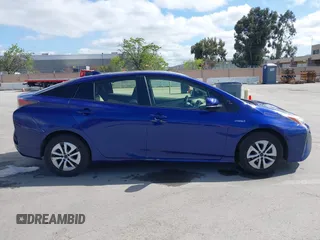 2016 Toyota Prius Two z VIN JTDKBRFU7G3528399, wystawiony jako IAAI lot #41975628 z przebiegiem 188 282 mil mil oraz . Historia ofert i sprzedaży dostępna na DreamBid. Obrazek 13.