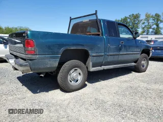 1999 Dodge 2500 with VIN 1B7KF23W2XJ539940, listed as a Copart auction lot 64237595 with 211,718 mi miles and Salvage title. Bid and sale history available at DreamBid. Image 3.
