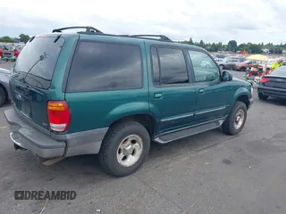 1999 Ford Explorer XLT with VIN 1FMZU34E1XZB72588, listed as a IAAI auction lot 42598441 with 233,717 mi miles and . Bid and sale history available at DreamBid. Image 4.