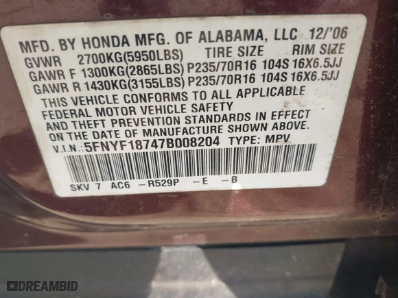 2007 Honda Pilot EX-L with VIN 5FNYF18747B008204, listed as a IAAI auction lot 41668603 with 223,213 mi miles. Bid and sale history available at carsss.com. Image 9.