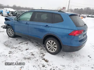 2018 Volkswagen Tiguan S z VIN 3VV0B7AX8JM081263, wystawiony jako IAAI lot #41245308 z przebiegiem 58 778 mil mil oraz . Historia ofert i sprzedaży dostępna na DreamBid. Obrazek 3.