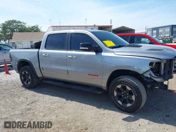 2022 Ram 1500 Rebel z VIN 1C6SRFLT2NN351050, wystawiony jako IAAI lot #41976882 z przebiegiem 59 490 mil mil oraz . Historia ofert i sprzedaży dostępna na DreamBid. Obrazek 14.