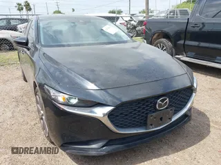 2021 Mazda 3 Select with VIN JM1BPABL9M1316515, listed as a IAAI auction lot 42176470 with 78,297 mi miles and . Bid and sale history available at DreamBid. Image 1.