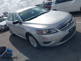 2011 Ford Taurus SE with VIN 1FAHP2DW3BG118603, listed as a IAAI auction lot 41944340 with 34,451 mi miles. Bid and sale history available at carsss.com. Image 1.