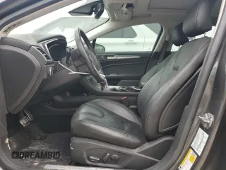 2016 Ford Fusion Titanium Hybrid with VIN 3FA6P0RU9GR289892, listed as a Copart auction lot 42735125 with 82,386 mi miles and Salvage Title. Bid and sale history available at carsss.com. Image 7.
