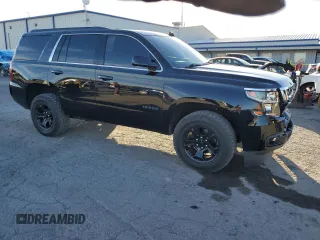 2020 Chevrolet Tahoe LS with VIN 1GNSCAKC1LR300537, listed as a Copart auction lot 77272554 with 51,108 mi miles and Salvage title. Bid and sale history available at DreamBid. Image 4.