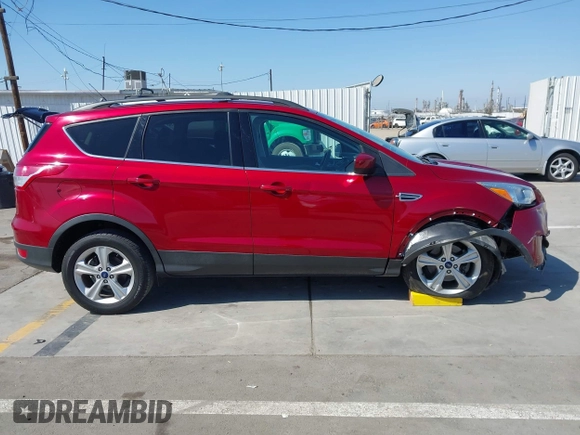 2014 Ford Escape SE with VIN 1FMCU0GX7EUD80714, listed as a IAAI auction lot 41981789 with 84,626 mi miles and . Bid and sale history available at DreamBid. Image 13.