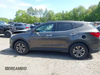 2014 Hyundai Santa Fe with VIN 5XYZTDLB2EG143925, listed as a IAAI auction lot 42243761 with 126,058 mi miles and . Bid and sale history available at DreamBid. Image 14.