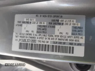 2012 Mazda 5 Sport with VIN JM1CW2BL3C0125660, listed as a IAAI auction lot 41595395 with 163,953 mi miles. Bid and sale history available at carsss.com. Image 9.