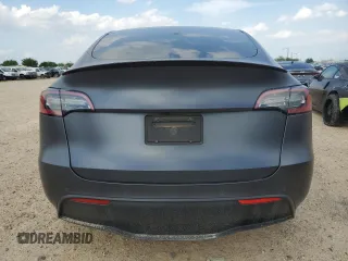 2022 Tesla Model Y Performance with VIN 7SAYGDEF2NF460730, listed as a Copart auction lot 54127945 with 59,735 mi miles and Salvage title. Bid and sale history available at DreamBid. Image 6.