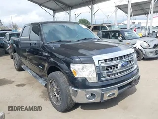 2014 Ford F-150 XL with VIN 1FTFW1CTXEKE56183, listed as a IAAI auction lot 41900304 with 94,597 mi miles and . Bid and sale history available at DreamBid. Image 1.
