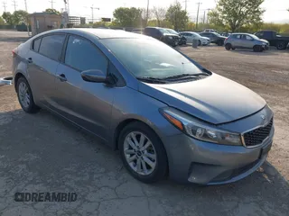 2017 Kia Forte S with VIN 3KPFL4A74HE104627, listed as a IAAI auction lot 41836877 with 94,709 mi miles and . Bid and sale history available at carsss.com. Image 1.