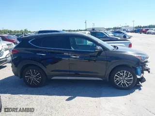 2021 Hyundai Tucson Limited with VIN KM8J33AL9MU305948, listed as a IAAI auction lot 41834956 with 100,098 mi miles. Bid and sale history available at carsss.com. Image 13.
