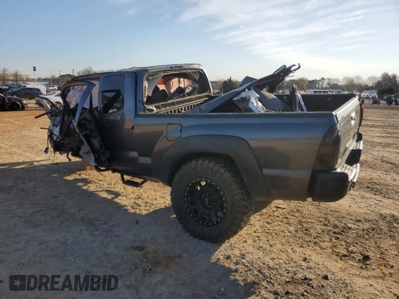 2015 Toyota Tacoma z VIN 5TFUX4EN6FX030970, wystawiony jako Copart lot #50354015 z przebiegiem Nie podano mil oraz Szkoda całkowita • Salvage title. Historia ofert i sprzedaży dostępna na DreamBid. Obrazek 2.