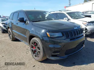 2017 Jeep Grand Cherokee SRT with VIN 1C4RJFDJ2HC696025, listed as a IAAI auction lot 41863274 with 126,949 mi miles. Bid and sale history available at carsss.com. Image 1.