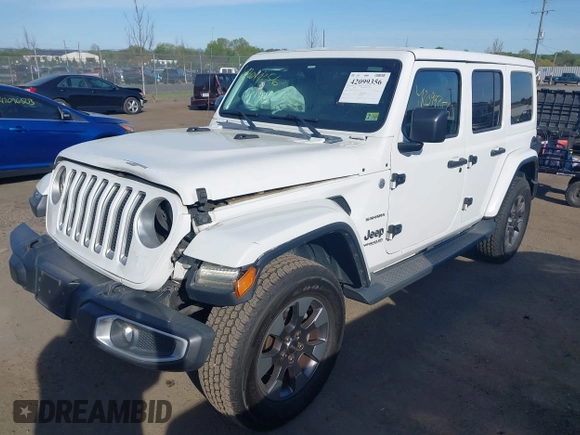 2018 Jeep Wrangler Unlimited Sahara z VIN 1C4HJXEG9JW227829, wystawiony jako IAAI lot #42099356 z przebiegiem 130 259 mil mil oraz . Historia ofert i sprzedaży dostępna na DreamBid. Obrazek 2.