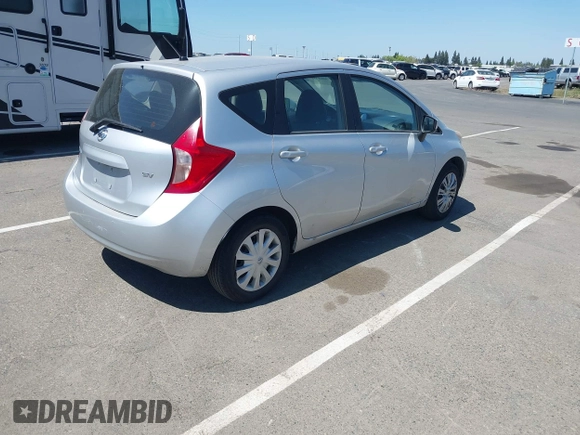 2015 Nissan Note SV with VIN 3N1CE2CP3FL415749, listed as a IAAI auction lot 42083581 with 143,603 mi miles and . Bid and sale history available at DreamBid. Image 4.