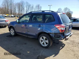 2014 Subaru Forester 2.5i Premium with VIN JF2SJAEC5EH517478, listed as a Copart auction lot 52067715 with 100,707 mi miles and Salvage Title. Bid and sale history available at carsss.com. Image 2.