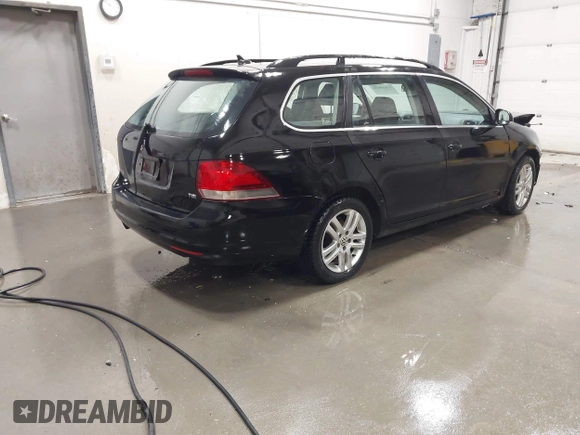 2011 Volkswagen Jetta SportWagen TDI with VIN 3VWPL7AJ8BM676246, listed as a IAAI auction lot 41831636 with 119,638 mi miles. Bid and sale history available at carsss.com. Image 4.