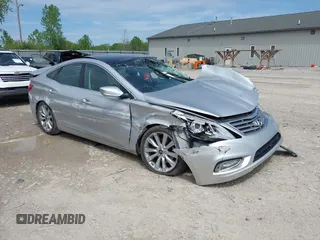 2013 Hyundai Azera z VIN KMHFH4JG5DA225239, wystawiony jako IAAI lot #42166107 z przebiegiem 118 350 mil mil oraz . Historia ofert i sprzedaży dostępna na DreamBid. Obrazek 1.
