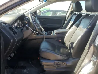 2013 Mazda CX-9 Touring с VIN JM3TB3CA8D0404707, выставлен на аукционе Copart как лот 56322885 с пробегом 218 205 миль миль и Списание • Salvage title. История ставок и продаж доступна на DreamBid. Изображение 7.