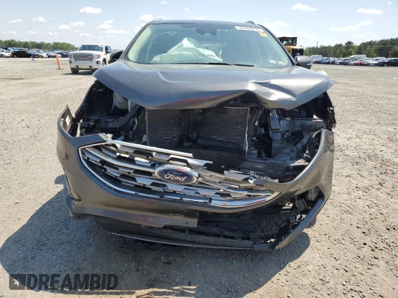 2020 Ford Edge SEL с VIN 2FMPK4J93LBB60742, выставлен на аукционе Copart как лот 52604255 с пробегом 37 659 миль миль и Списание • Salvage title. История ставок и продаж доступна на DreamBid. Изображение 5.