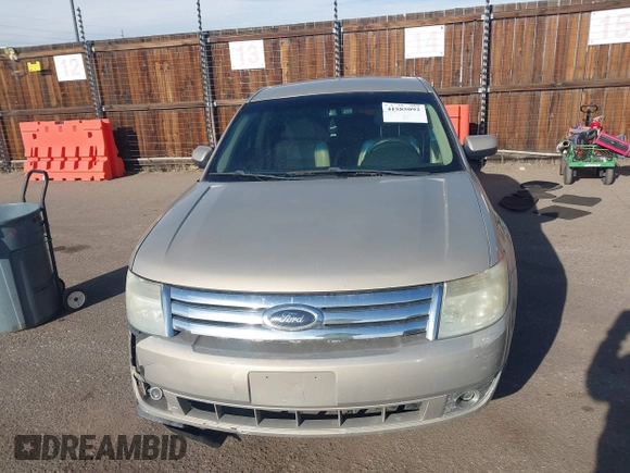 2008 Ford Taurus SEL with VIN 1FAHP24W38G111319, listed as a IAAI auction lot 41585092 with 216,419 mi miles. Bid and sale history available at carsss.com. Image 12.