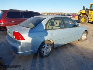 2003 Honda Civic Hybrid with VIN JHMES956X3S019115, listed as a IAAI auction lot 41214960 with 303,472 mi miles. Bid and sale history available at carsss.com. Image 4.