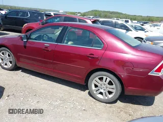 2007 Ford Fusion SEL with VIN 3FAHP08117R102788, listed as a IAAI auction lot 41969561 with 174,678 mi miles. Bid and sale history available at carsss.com. Image 3.