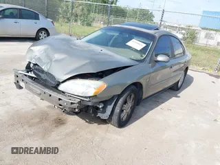 2003 Ford Taurus SEL Deluxe with VIN 1FAHP56S23G140685, listed as a IAAI auction lot 42109024 with 83,551 mi miles and . Bid and sale history available at DreamBid. Image 2.
