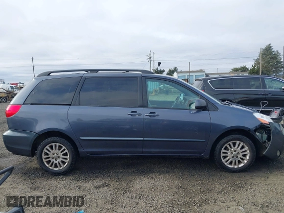 2008 Toyota Sienna XLE with VIN 5TDBK22C98S017300, listed as a IAAI auction lot 41433777 with 248,602 mi miles. Bid and sale history available at carsss.com. Image 13.