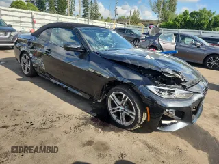 2023 BMW 4 Series 430i with VIN WBA23AT02PCL61138, listed as a Copart auction lot 67364435 with 18,698 mi miles and Salvage title. Bid and sale history available at DreamBid. Image 4.