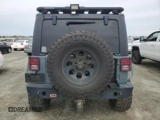2015 Jeep Wrangler Unlimited Rubicon with VIN 1C4BJWFG7FL674201, listed as a Copart auction lot 49466455 with 0 mi miles and Salvage Title. Bid and sale history available at carsss.com. Image 6.