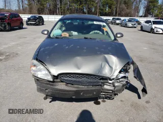 2003 Ford Taurus SEL Deluxe with VIN 1FAFP56S93G222243, listed as a Copart auction lot 46496165 with 193,282 mi miles and Salvage Title. Bid and sale history available at DreamBid. Image 5.