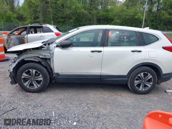 2018 Honda CR-V LX with VIN 2HKRW5H36JH409111, listed as a IAAI auction lot 42133939 with 105,511 mi miles and . Bid and sale history available at DreamBid. Image 14.